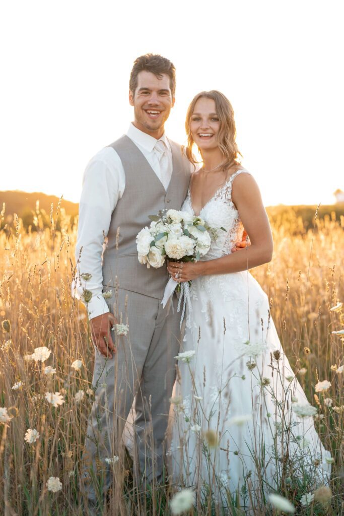 Bride and groom portrait in field near LaCrosse, WI